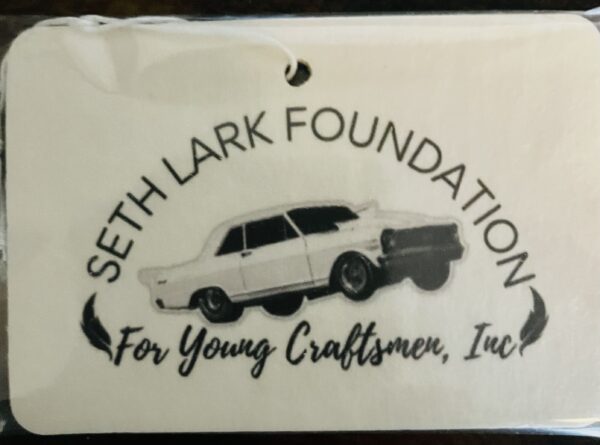 Logo: Seth Lark Foundation with vintage car.
