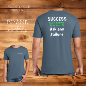 A man wearing a blue shirt with the words " success " written on it.
